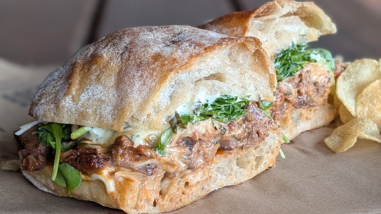 Close-up of Pizzaiola sandwich on ciabatta bread