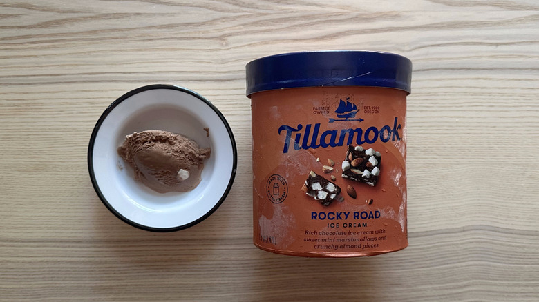 Bowl and container of Tillamook's Rocky Road ice cream