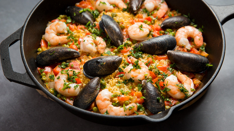 seafood rice dish in pan