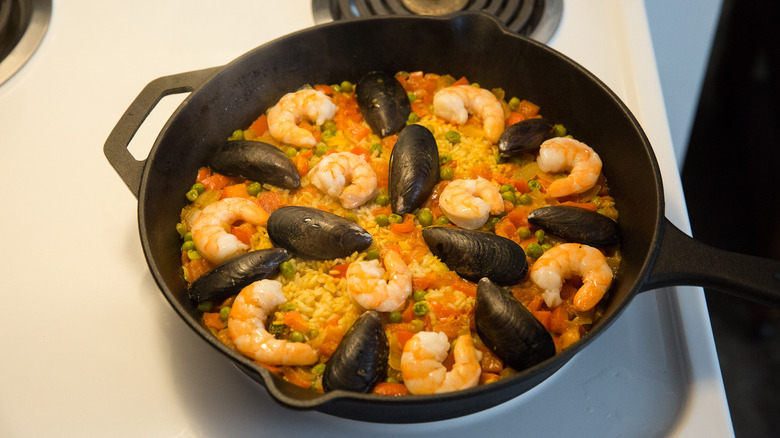 seafood rice dish in pan