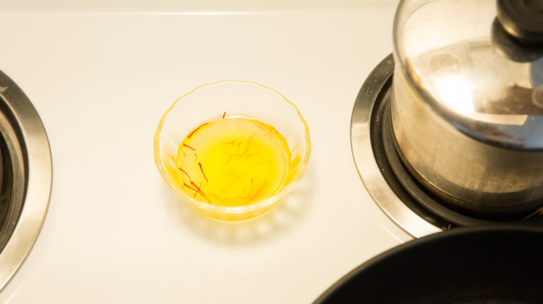saffron liquid in small dish