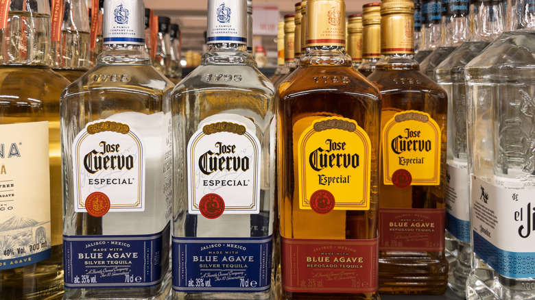 Bottles of Jose Cuervo tequila on a shelf