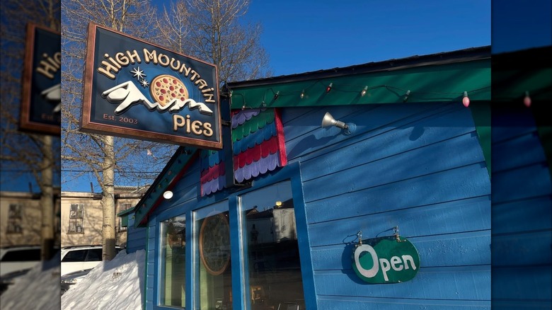 Rustic, blue-colored exterior of High Mountain Pies