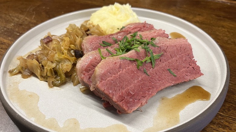 Plated brined corned Beef with cabbage and mashed potatoes