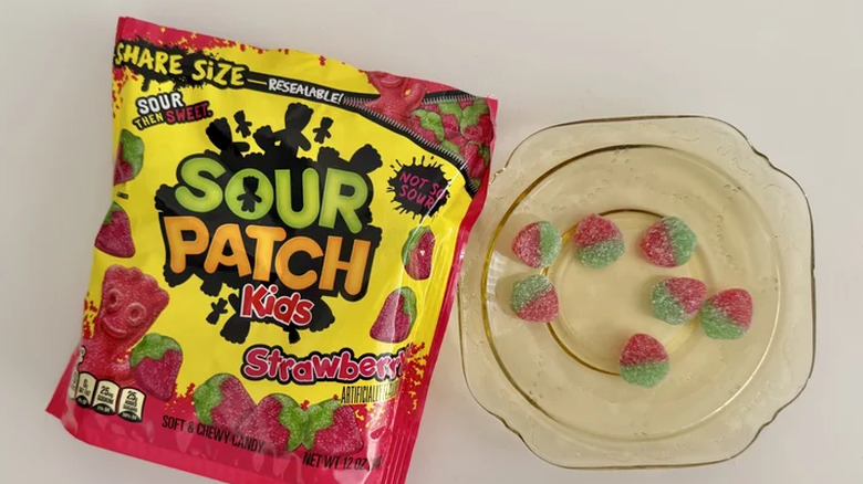 Sour Patch Kids Strawberries in a bowl and bag