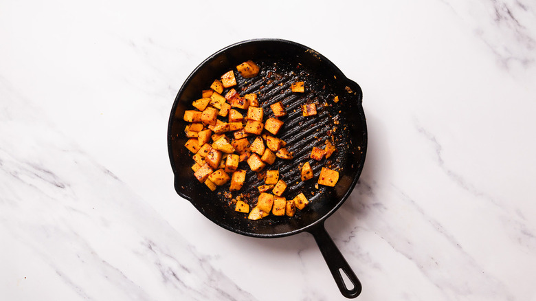 Skillet with sweet potatoes