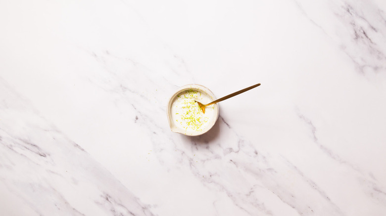 Lime crema with spoon