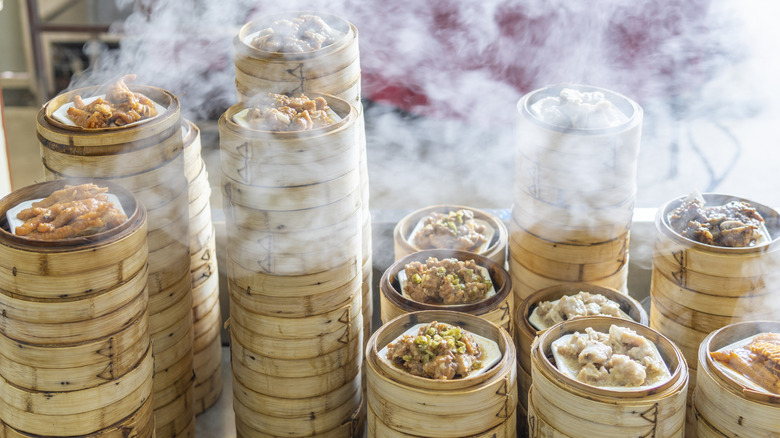 Stacks of dim sum in bamboo steamers