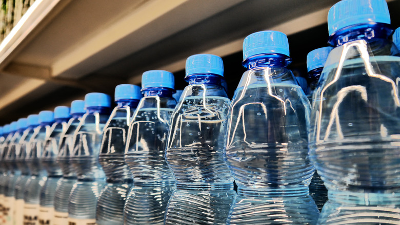 Row of bottled water on the grocery store shelf