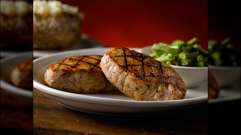 Grilled pork chops on plate