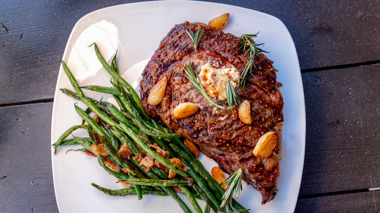 plate of steak and beans