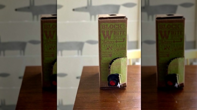 Box of Block White Sauvignon Blanc on wooden table