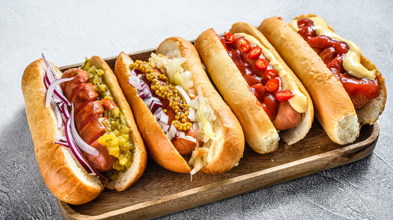 hot dogs with assorted toppings
