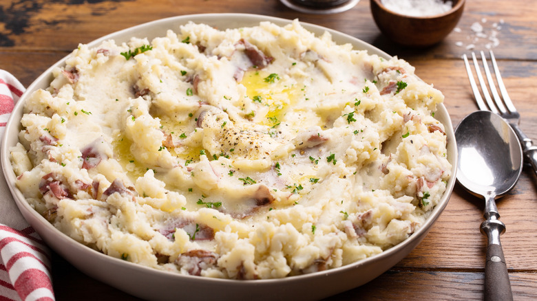 Mashed potatoes with skins, herbs, and spices