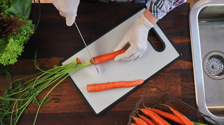 plastic cutting board with carrots