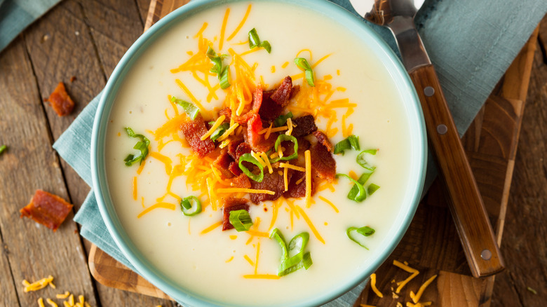 bowl of potato soup with bacon on top