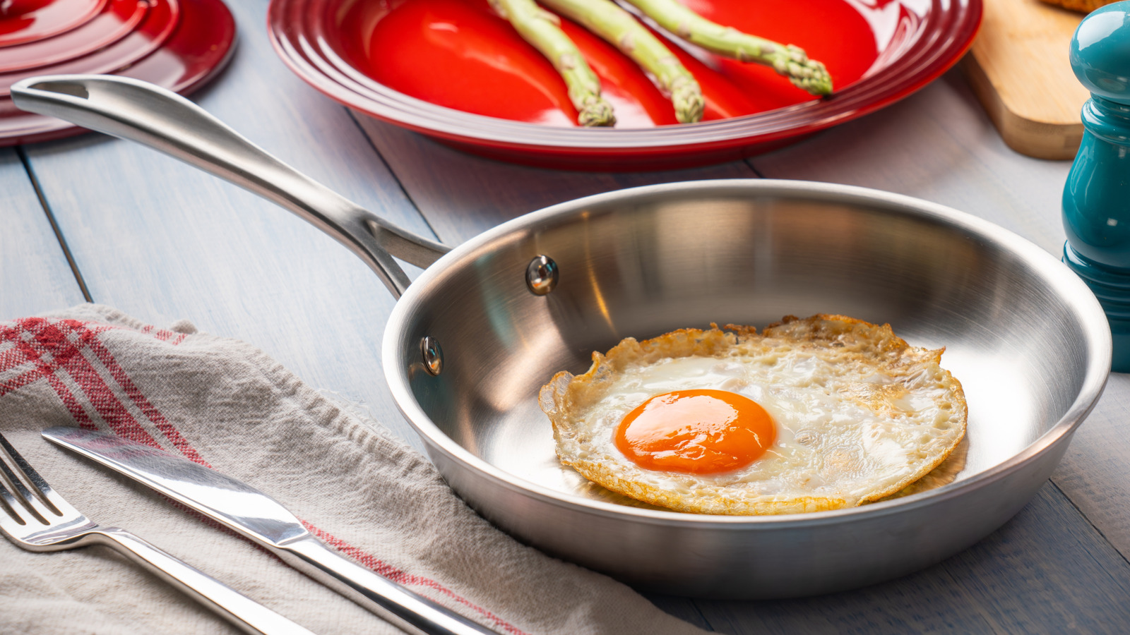 The Best Way To Keep Eggs From Sticking To Stainless Steel Doesn't Require Tons Of Oil - Tasting Table