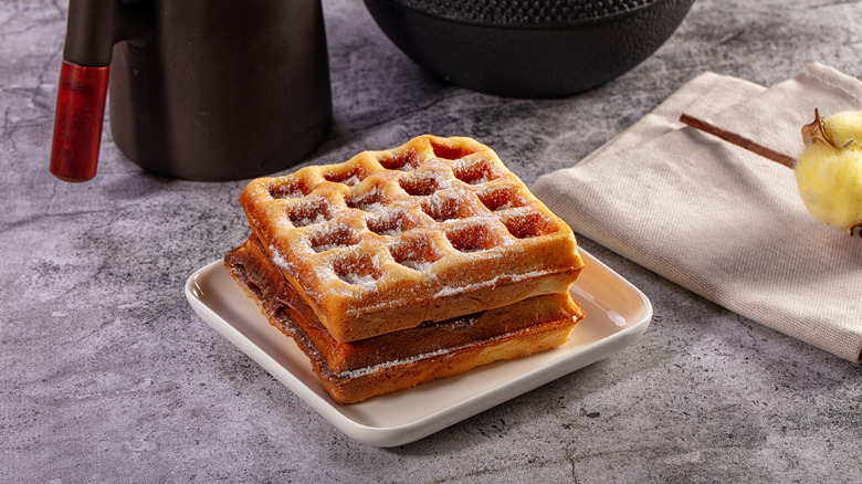 A plate of freshly-baked waffles