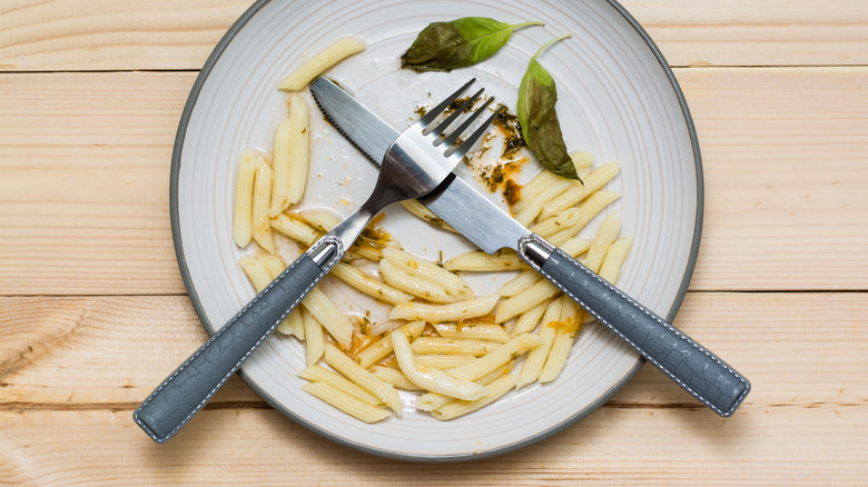 Leftover penne on a plate