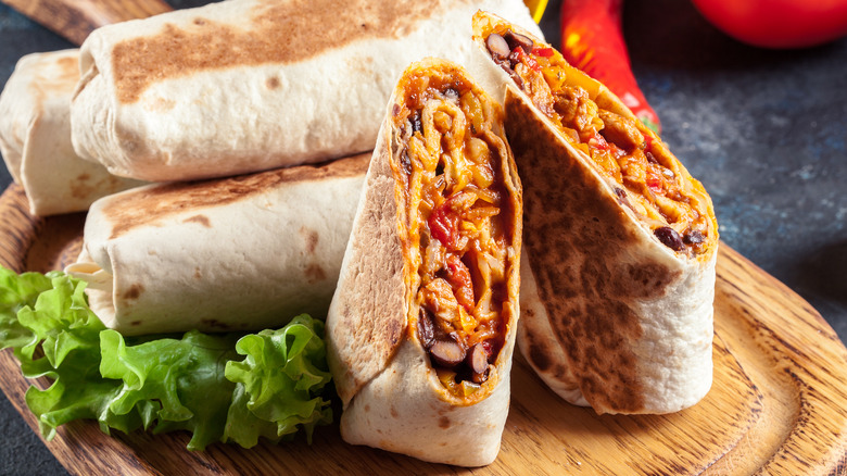 Burritos on a cutting board 