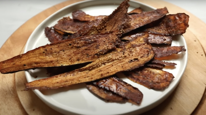 strips of eggplant bacon on plate