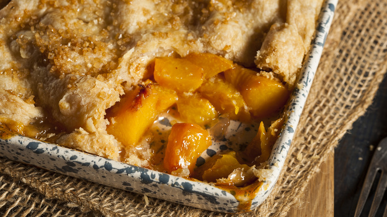 Peach cobbler in baking pan