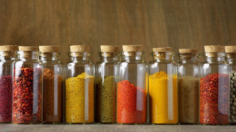 spices in glass bottles