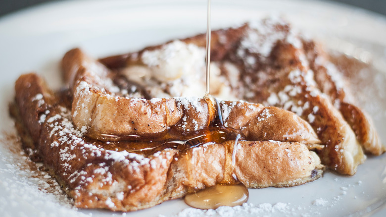 French toast with syrup and powdered sugar