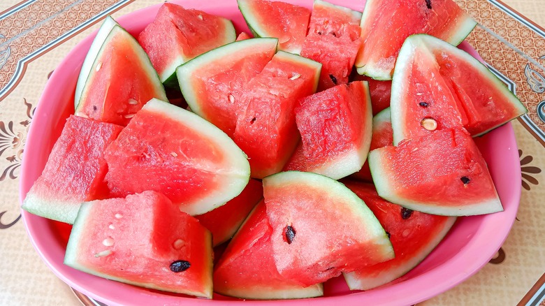 watermelon wedges on pink plate