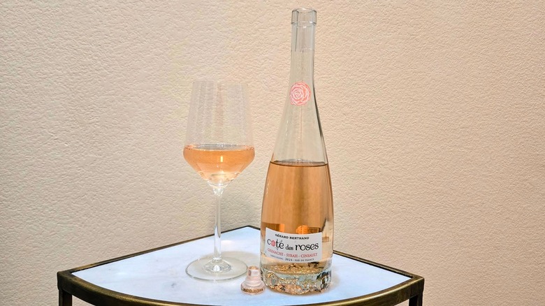 Bottle and glass of  Gerard Bertrand Cote des Roses rose