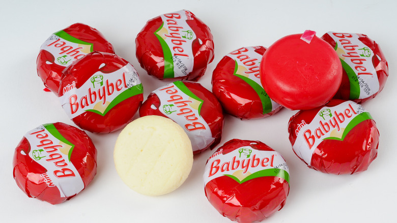 babybel cheese on a white background