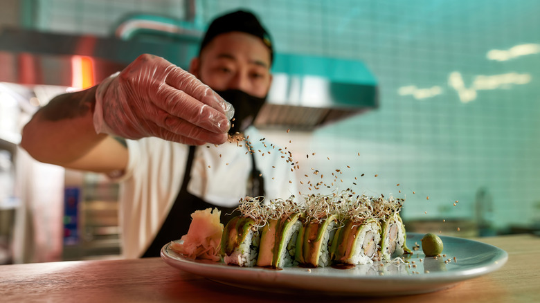 chef seasoning sushi