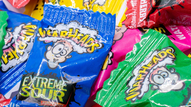 Multiple packages of Warheads in various colors