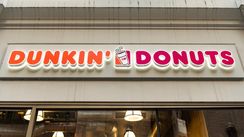 close up of Dunkin' Donuts sign on restaurant