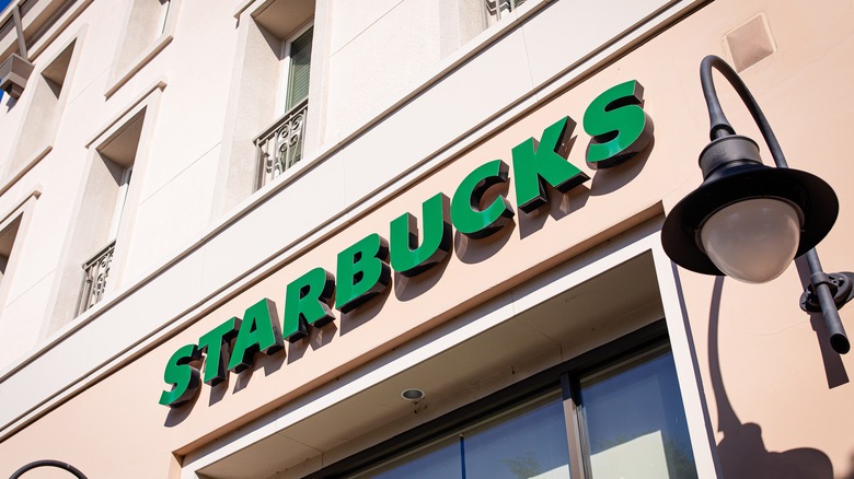 closeup of Starbucks logo sign on the store exterior
