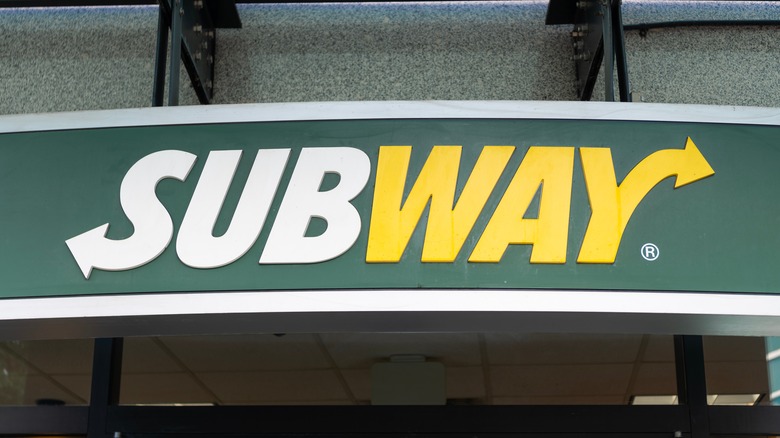 close up of Subway sign outside restaurant