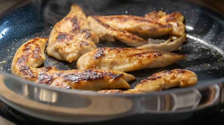 Chicken searing in pan