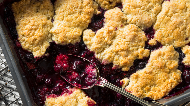berry cobbler with spoon