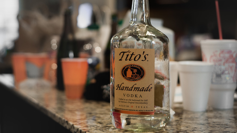 bottle of tito's on countertop