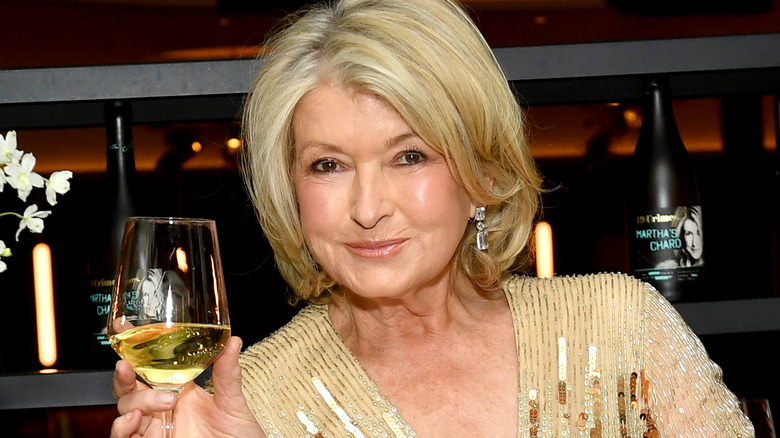 Martha stewart with glass of white wine