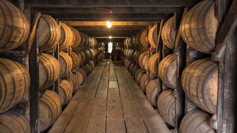 Bourbon aging in wooden barrels 