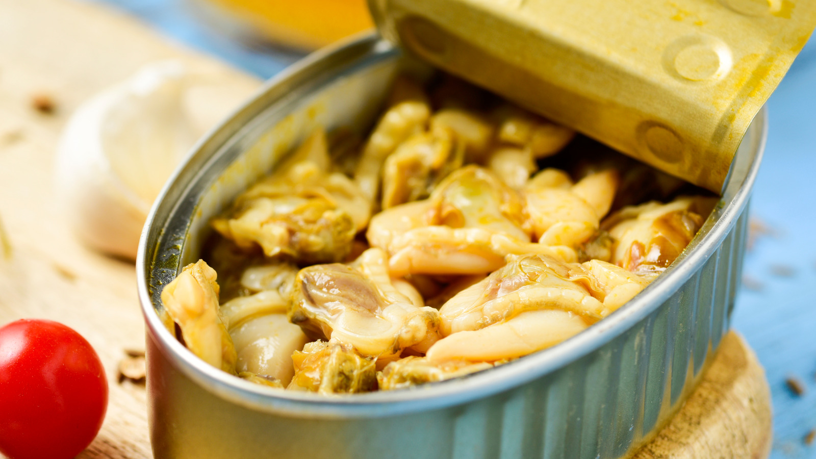 The Bottled Ingredient That Can Help Your Can Of Clams Go Even Further