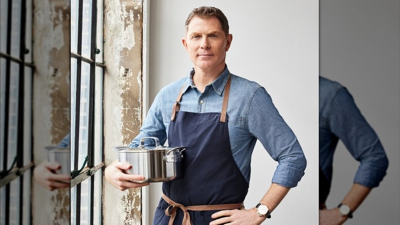 Bobby Flay holding branded pot