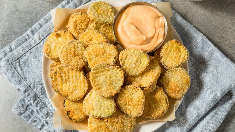 Breaded pickles with spicy mayo dip