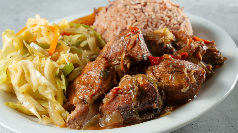 Jamaican brown chicken stew with rice