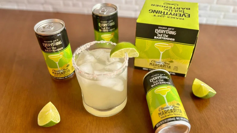 Trader Joe's Everything But the Bartender margarita in cans and glass with ice
