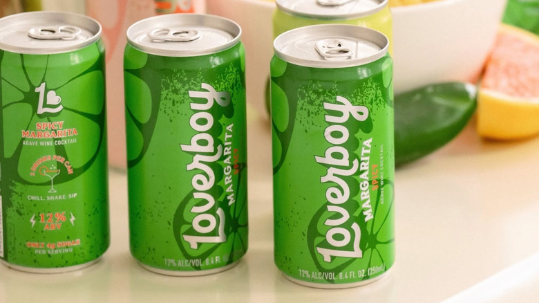 Cans of Loverboy spicy margarita on countertop