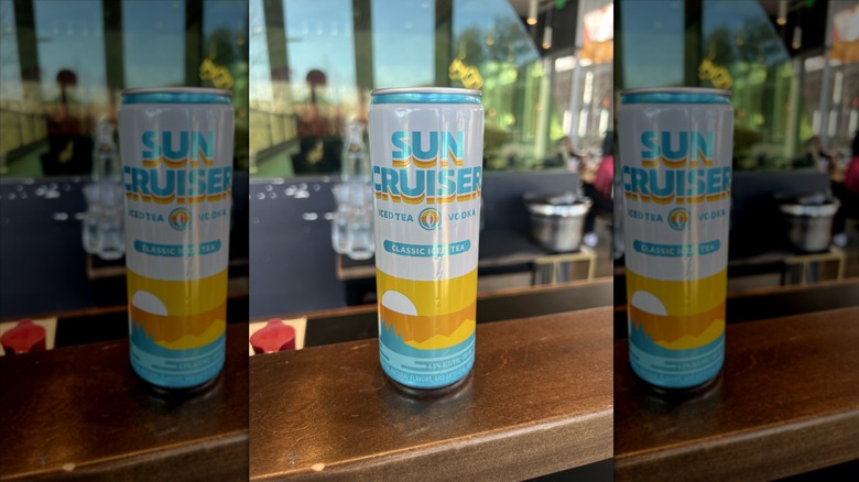 Can of Sun Cruiser on wooden surface