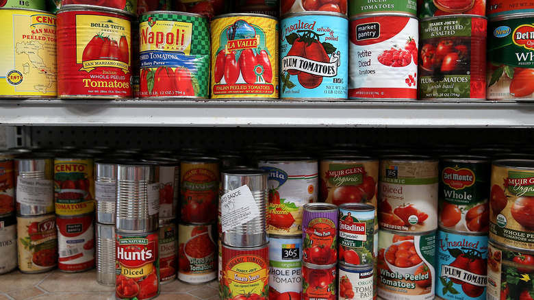 Shelf display of canned tomatoes