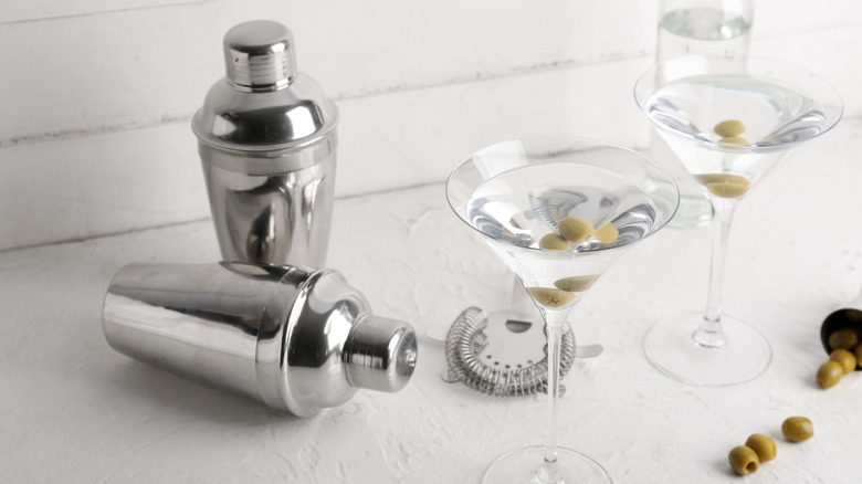 Cocktail shakers with martini glasses.